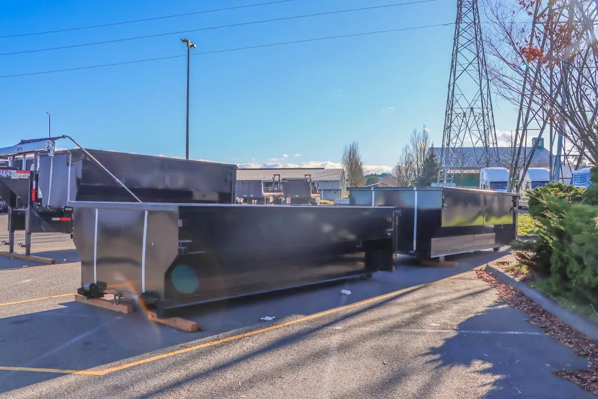 Roll-off dumpster ready for waste disposal at job site for Concrete Dumpster Rental in Gautier